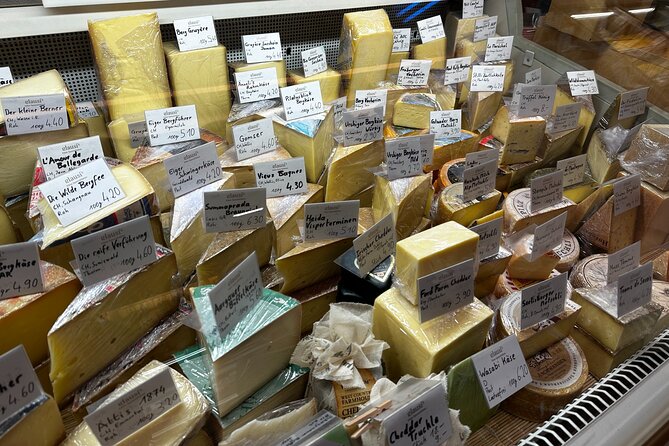 Basel: Farmer's Market, Cheese, Chocolate & Pastry Tour - Basel Minster and Roothus: why the landmarks matter on a food tour