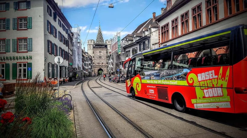 Basel: Sightseeing Bus Tour with Audio Guide - Meeting the bus at Steinenberg 4 by the Tinguely Fountain