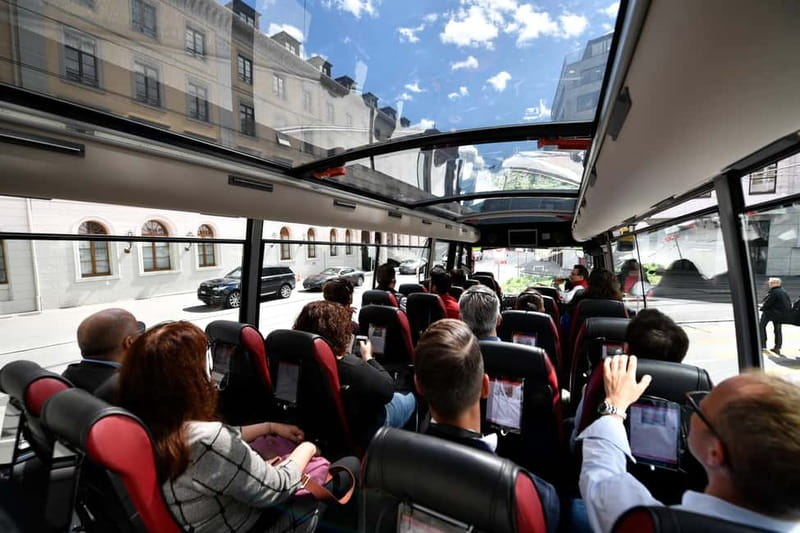 Basel: Sightseeing Bus Tour with Audio Guide - Your 2-hour route, from Marktplatz squares to Basel Cathedral area