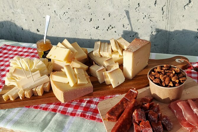 Cheese and chocolate on mountain summit - Beyond cheese: cold cuts, bread or crackers, jam and marmalade