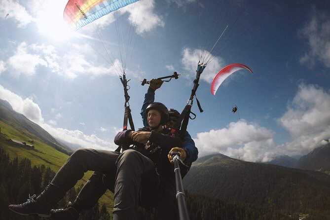 DAVOS: Paragliding Tandem Flight In Swiss Alps (Video & Photos Included) - Meeting Point at Brämabüelstrasse 11, Davos, and the Cable Car Reality