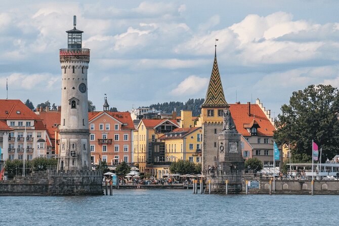 Discover 4 Countries in One Day from Basel in Small Group - Rhine Falls, Europe’s largest waterfall, up close by boat