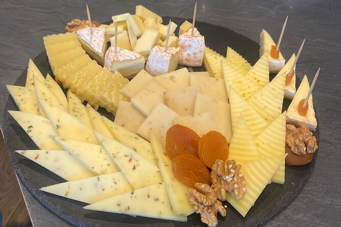 From Basel: Thun Tour, Beatus Caves, Lake Cruise & Cheese - Spiez stroll and the cheese option: a slower finish