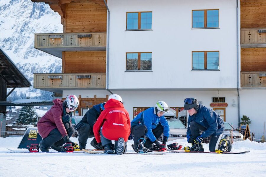 From Interlaken: Grindelwald Beginners Snowboarding Lesson - Grindelwald’s beginner snowboarding setup, with Eiger views