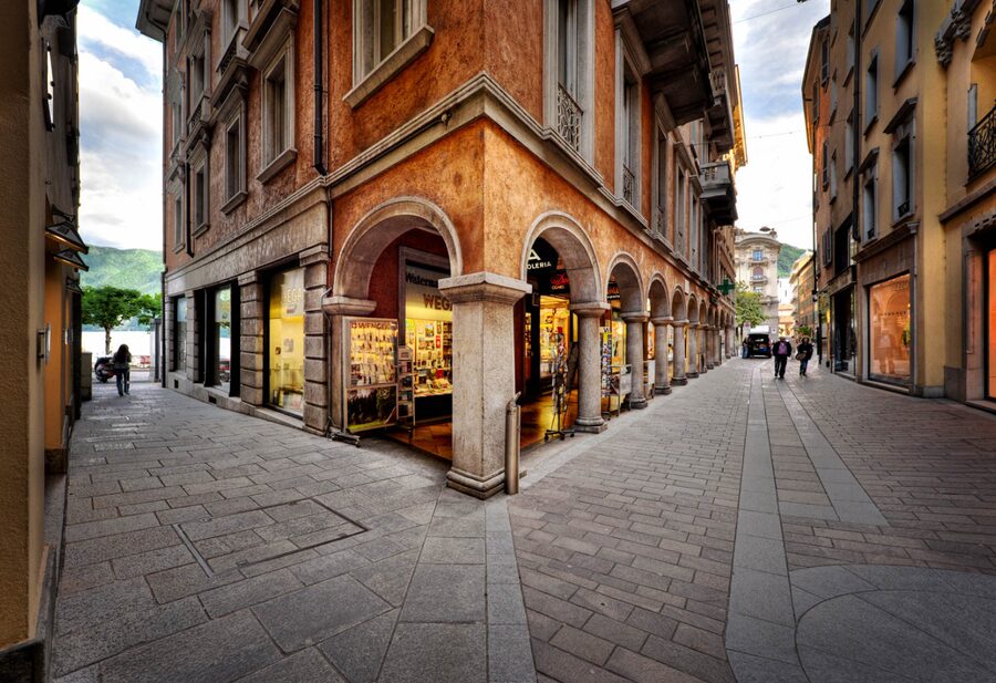 From Milan: Como, Bellagio, and Lugano Exclusive Boat Tour - Crossing To Lugano: Passport In Hand, Alps In View