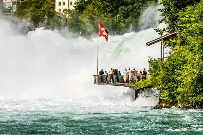 From Zurich: Rhine Falls Coach Tour with Entry Tickets - Coach efficiency on the return, plus a quick border crossing