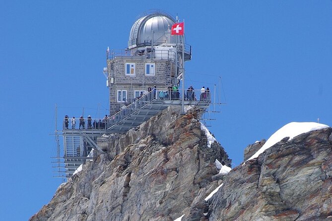 From Zurich to Top of Europe Jungfraujoch private tour - Kleine Scheidegg: the short breather before the ascent