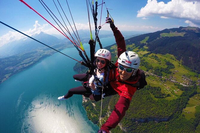 Full-Day Guided Tour To Interlaken with Paragliding Flight - Zurich to Interlaken: The Panoramic Bus Part You Should Actually Enjoy