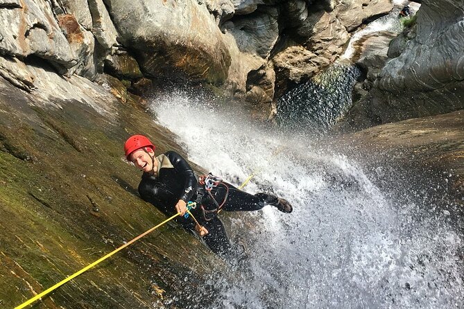 Fun and Adventure - Best beginner canyoning near Bellinzona - The end of the canyon: dry clothes, snacks, and media from your guide