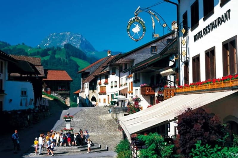 Geneva: Gruyères Tour with Chocolate, Cheese & Golden Train - Gruyères medieval village free time: short, sweet wandering with real castle energy