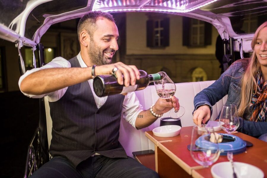 Geneva: tour with fondue and wine in TukTuk - How the fondue stop works, bread or potatoes plus wine