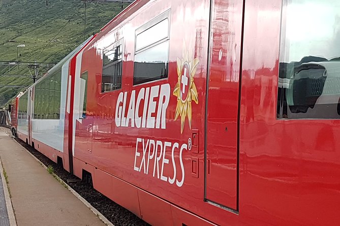 Glacier Express Panoramic Train Round Trip from Zürich With Private Guide - Andermatt for 10 minutes: best use of a short town stop