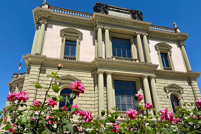 Guided Tour of Geneva: Capital of Peace ( Outside ) - Palais des Nations facades: flags of member states explained outside