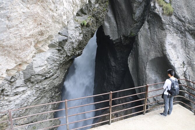 Interlaken Full-Day Highlights Tour with a Local by Private Car - St. Beatus-Hohlen caves above Lake Thun: a safe, lit 1 km walk