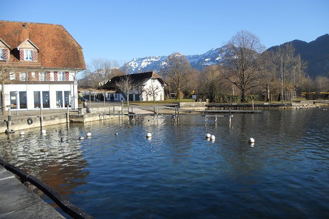 Interlaken Private Tour: Mountains Cows, Thun Lake, and Brienz Lake - Lake Thun at Unterseen: Neuhaus beach, coffee time, and a calm shoreline pause