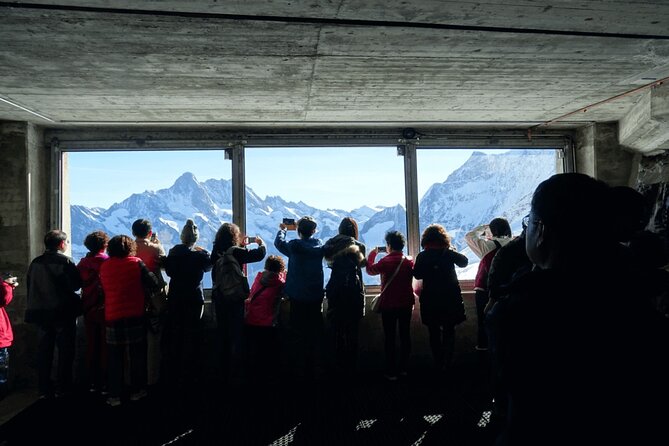 Jungfraujoch Private Tour – Top of Europe & Lauterbrunnen Valley - Ice Palace: walking through ice tunnels inside the mountain
