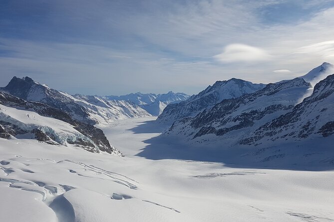 Jungfraujoch Top of Europe Private Day Trip from Basel - Top of Europe: What You Get Beyond The Postcard View