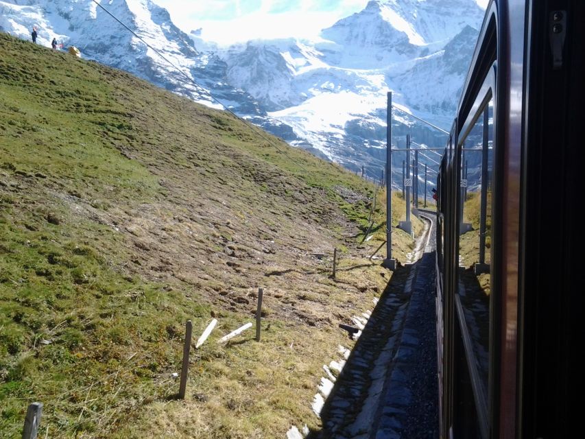 Jungfraujoch Top of Europe Private Day Trip from Bern - Jungfraujoch summit time: Sphinx Observatory and the outdoor deck