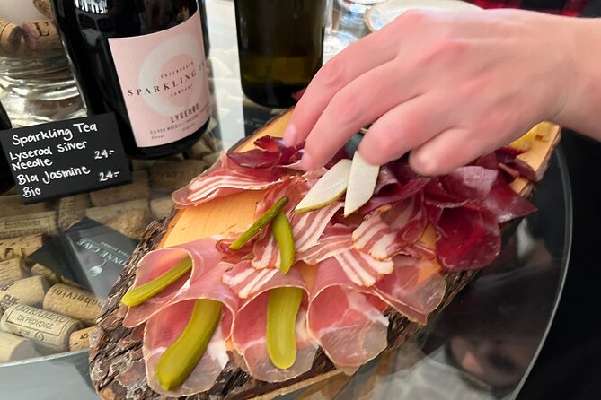 Lake Lucerne Region Wein Tasting - The included pairing: cheese, charcuterie, bread, and still water