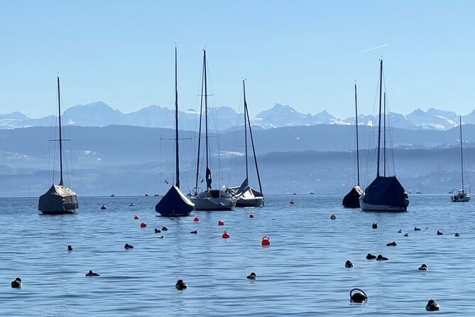 LINDT Home of Chocolate, Cruise On Lake Zurich And Old Town Walking Tour - Old Town walking tour: churches, windows, and story-rich corners