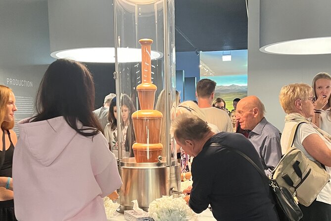 Lindt Home of Chocolate Museum Entry Ticket with Pickup - Walking Into the 9-Meter Chocolate Fountain