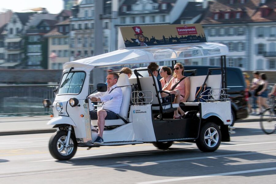Lucerne: eTukTuk City Tour - The Chapel Bridge and Lion Monument Combo That Anchors Lucerne