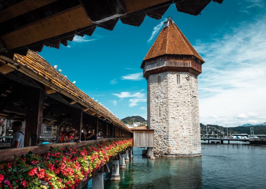 Lucerne: Express Walk with a Local in 60 minutes - Torbogen Luzern, Spreuer Bridge, and Mühlenplatz: the landmarks that anchor your orientation