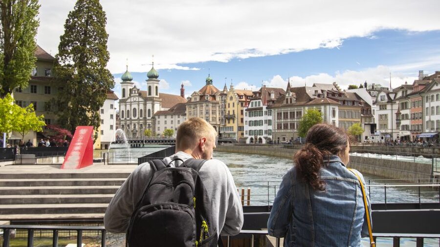 Lucerne: Express Walk with a Local in 60 minutes - Town hall clock tower: how the guide turns a photo spot into meaning