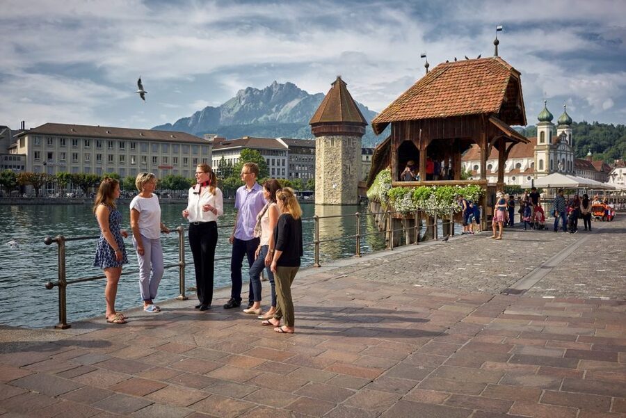 Lucerne: Guided Walking Tour with an Official Guide - Chapel Bridge, the octagonal water tower, and why it matters