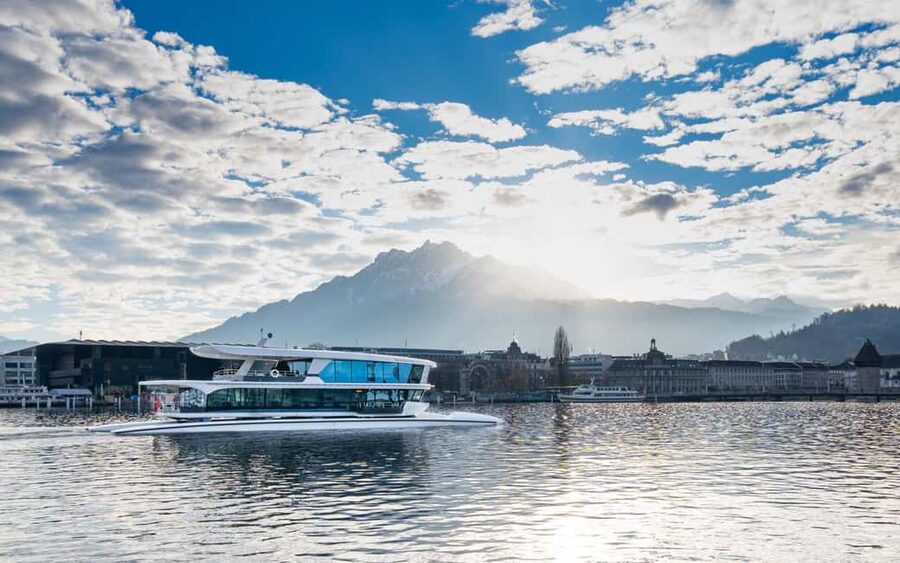 Lucerne: Lake Cruise & Old Town Tour w/ Guide & Photographer - Catamaran Time on Lake Lucerne, Panoramic Views Without the Stress
