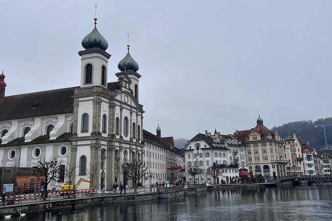 Lucerne Small-Group Walking Tour: History, Culture & Hidden Gems - Switzerland’s first baroque church, graceful lines by the river