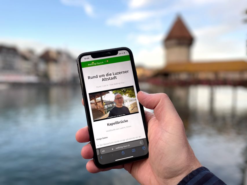 Lucerne: Smartphone walking tour - cool Lucerne old town - Getting started at Chapel Bridge on the Reuss