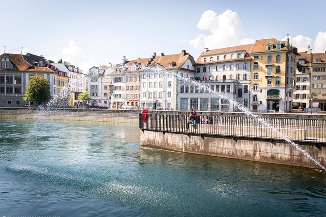 Lucerne Walking & Boat Tour: The Best Swiss Experience - Chaff Bridge and the landmark story that ties it together