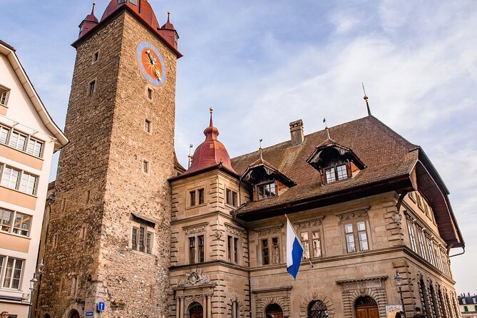 Premium Panoramic Train, Lucerne Old Town and Interlaken Tour - Lucerne meet-up at Jesuitenkirche, then a guided Old Town that gets to the point