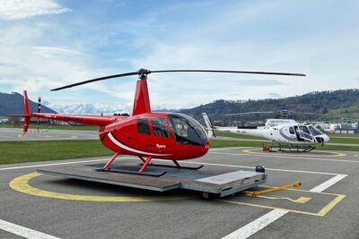 Private Swiss Alps helicopter tour over snow covered mountain peaks and glaciers