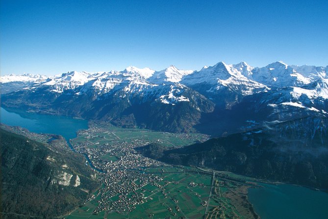 Swiss Alps: Interlaken and Grindelwald Day Trip from Zurich - Meeting at Sihlquai and Settling Into a Deluxe Coach Day