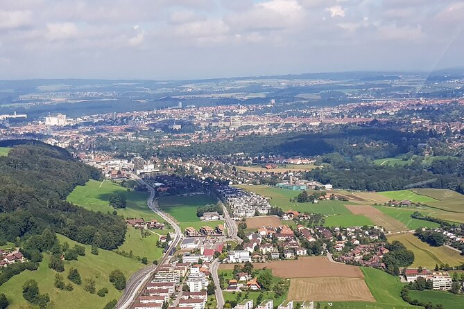 Swiss Capital city helicopter sightseeing tour - the ideal flight to see Berne - Stadium, Paul Klee Centrum, Westside, and the angles that matter