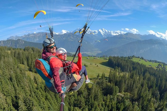 Tandem Paragliding Experience from Interlaken - What happens before takeoff: harnesses, briefing, and that tandem jog