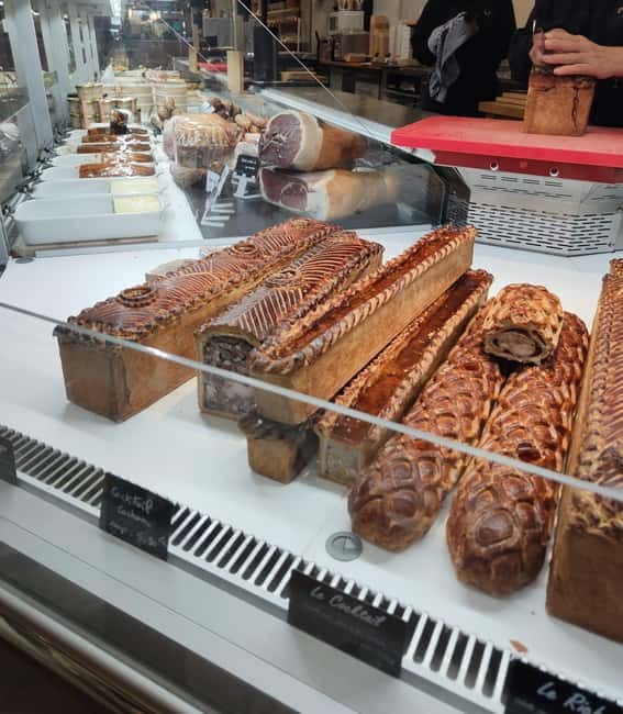 Taste Geneva: Exclusive Walking Food Tour with Full Meal - Rue du Marché and the covered market style of tasting