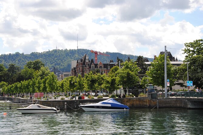 Zurich 360° City Walk Tour Including Hidden Spots - St. Peter’s Church and Münsterhof: the giant clock dial plus Roman threads