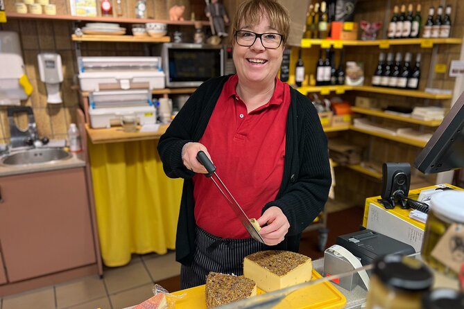 Zurich Food Tour with 10 Local Delicacies, Cheeses & Chocolates - Stop 3, Fraumünster Spires, St. Peter’s Clock, and Old-Town Views
