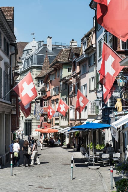 Zurich: Open Top Bus Sightseeing Tour with Optional Cruise - Belvoir Park and Rotes Schloss: the green views and the palace vibe